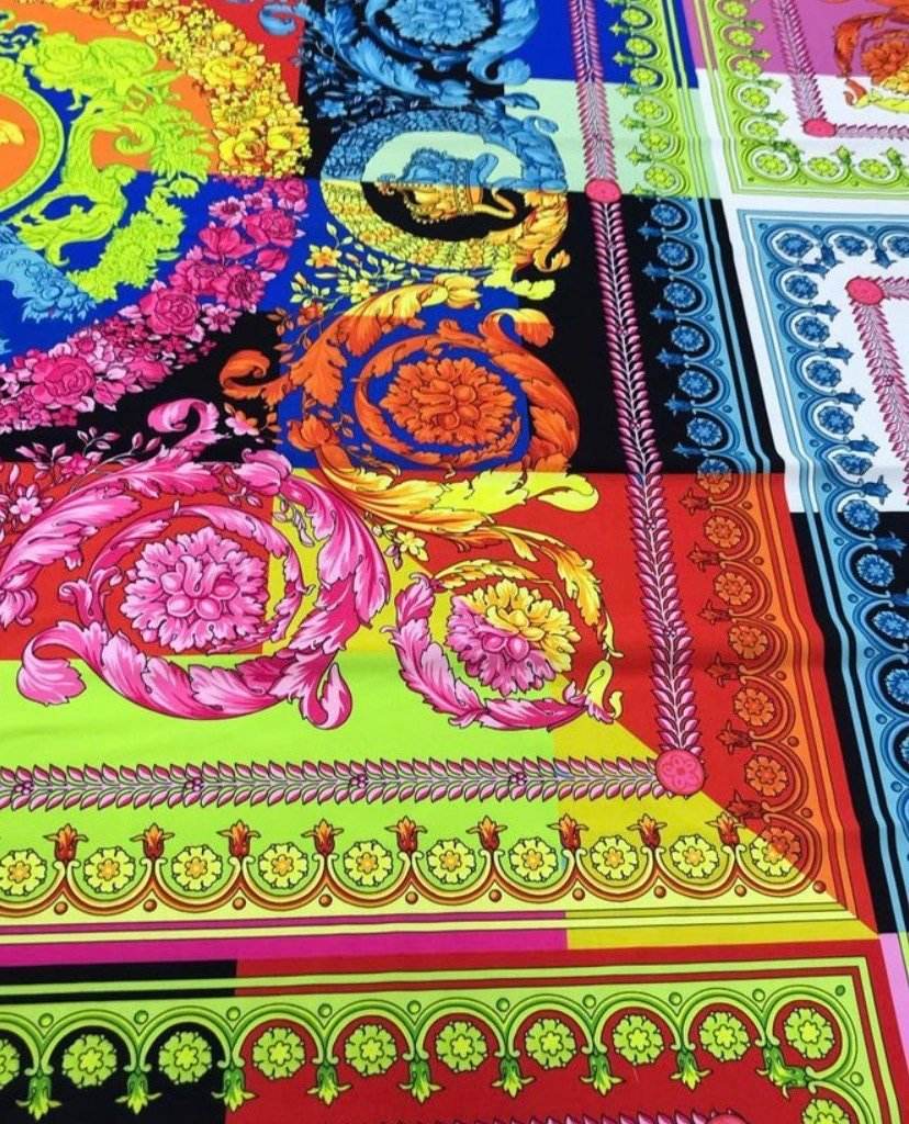 Vibrant multi-color Baroque pattern fabric with intricate floral and scroll designs, perfect for sewing projects