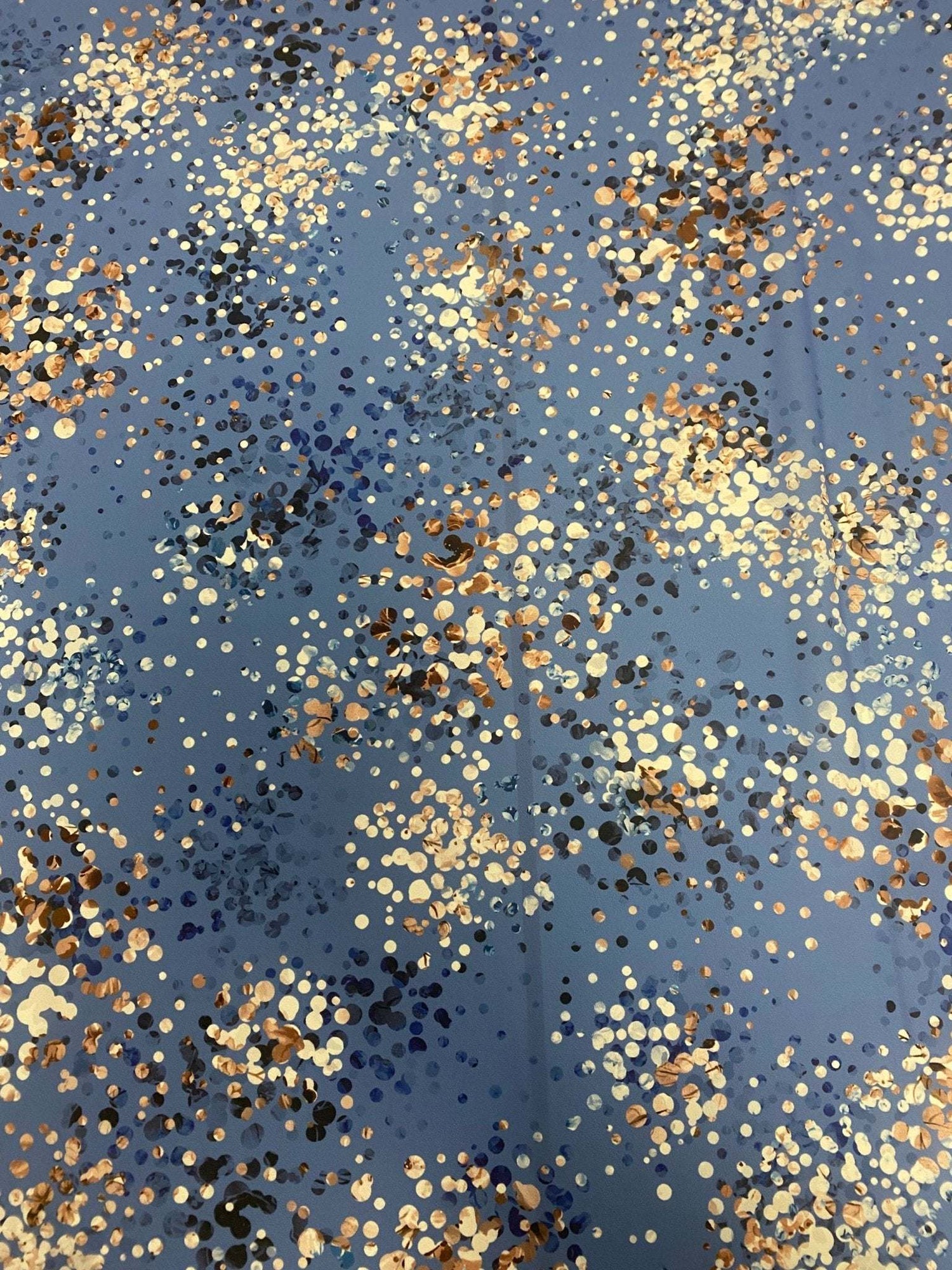 Blue fabric with multicolor confetti pattern abstract dot print