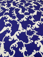 Baroque pattern navy blue fabric with elegant white floral design suitable for upholstery and drapery