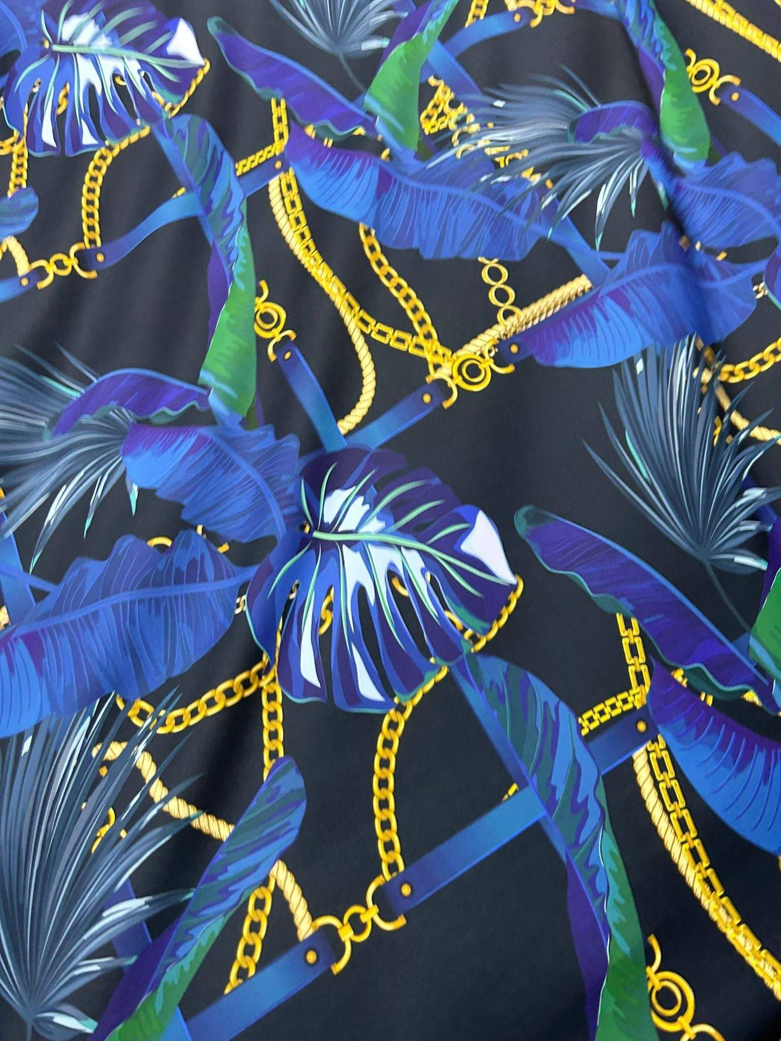 Navy blue fabric with leaf chain pattern and gold chain design by the yard