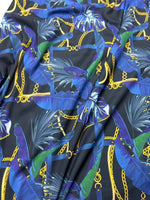 Navy blue fabric with leaf chain pattern and gold chain accents designed for apparel and decor projects