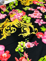 Orchid Baroque Floral Fabric with vibrant pink and green flowers and intricate gold baroque patterns on black background