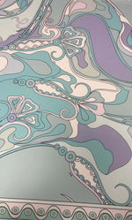 Pastel abstract swirl fabric with soft purple, blue, pink, and green flowing patterns