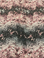 Pink and black abstract scales print fabric with textured optical illusion pattern, 150cm wide