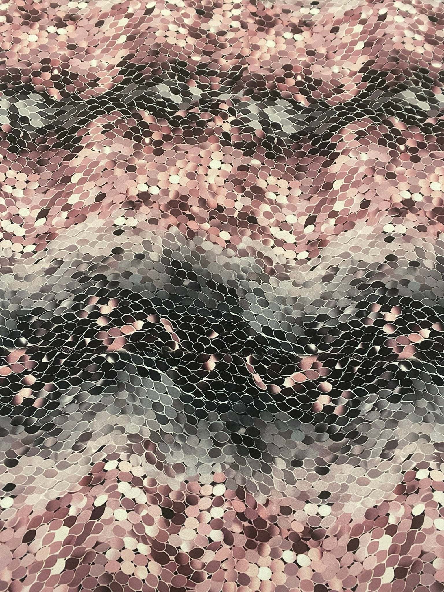 Pink and black abstract scales print fabric with textured optical illusion pattern, 150cm wide