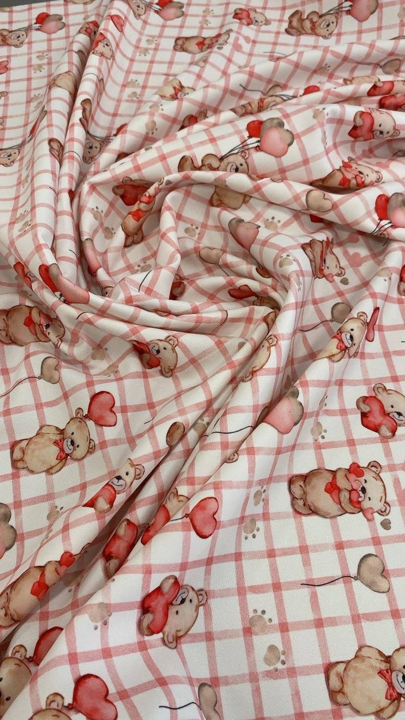 Pink plaid fabric with cute teddy bear and heart balloon print for crafting and sewing projects
