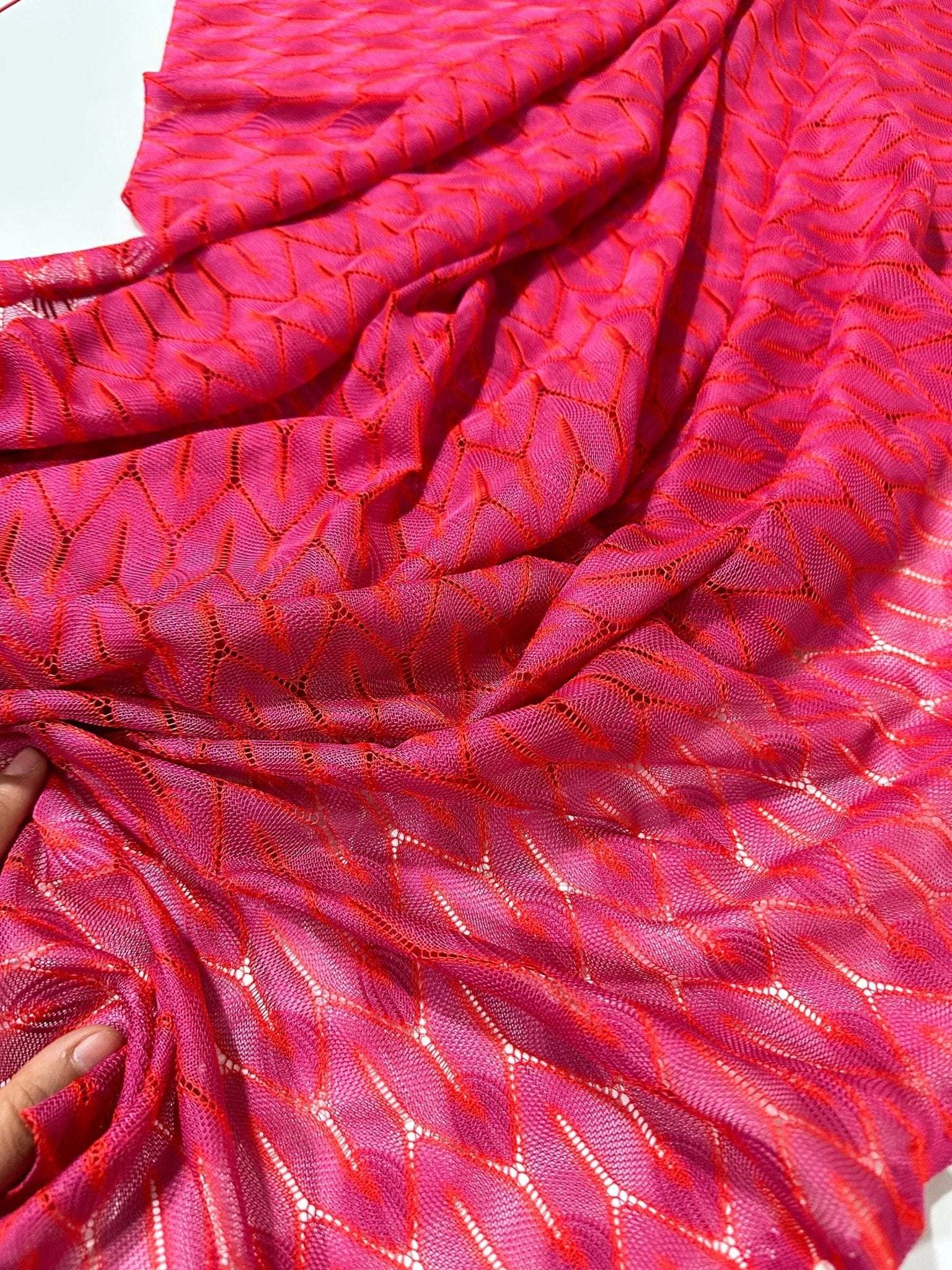 Pink and white chevron knit jersey fabric with zigzag pattern and soft texture, 150 cm wide, ideal for stylish garments