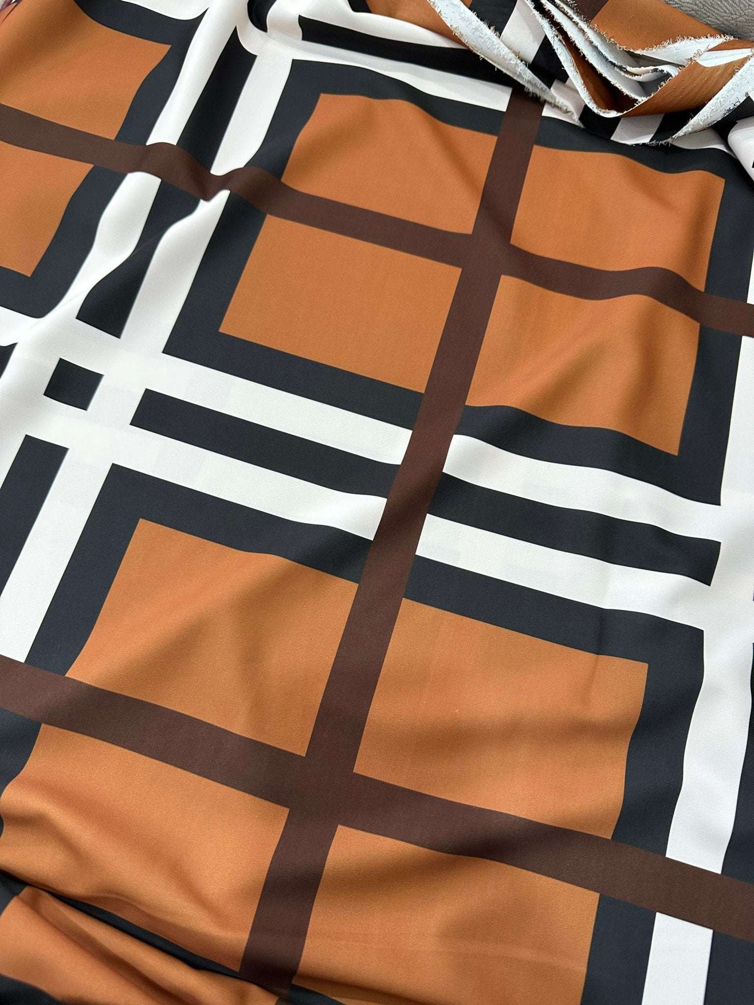 Brown and white striped plaid cotton fabric with wide stripes and a classic pattern