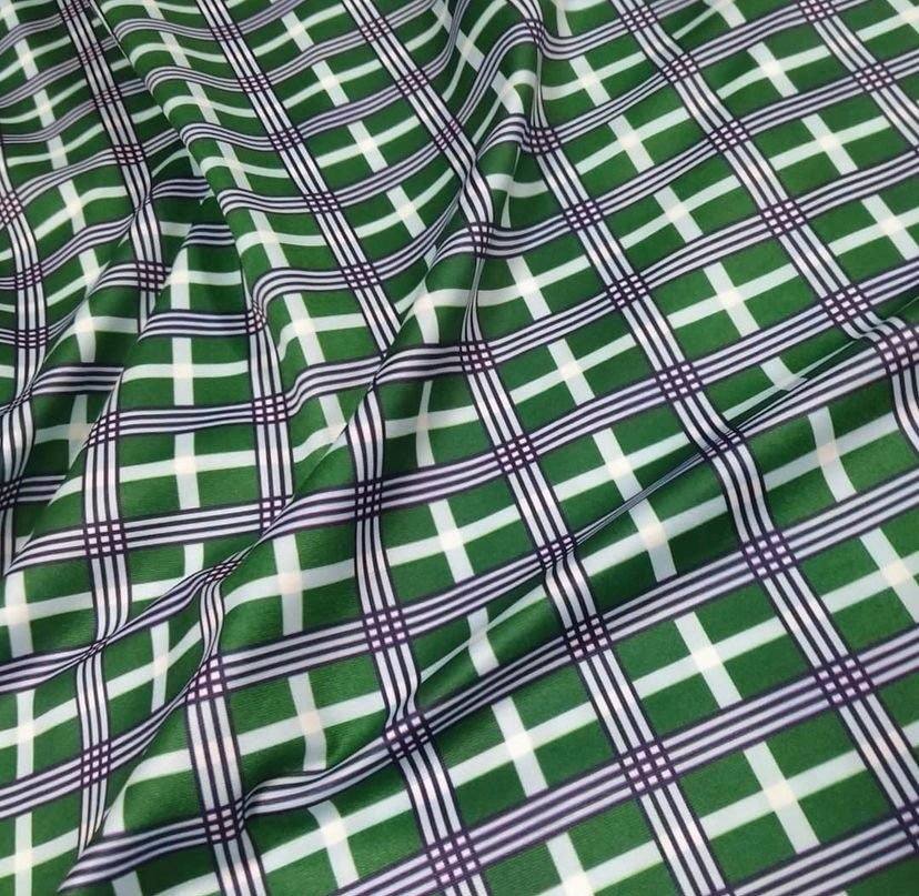 4-way stretch plaid fabric in green, black, white, and orange with 150cm width for sewing and crafting projects