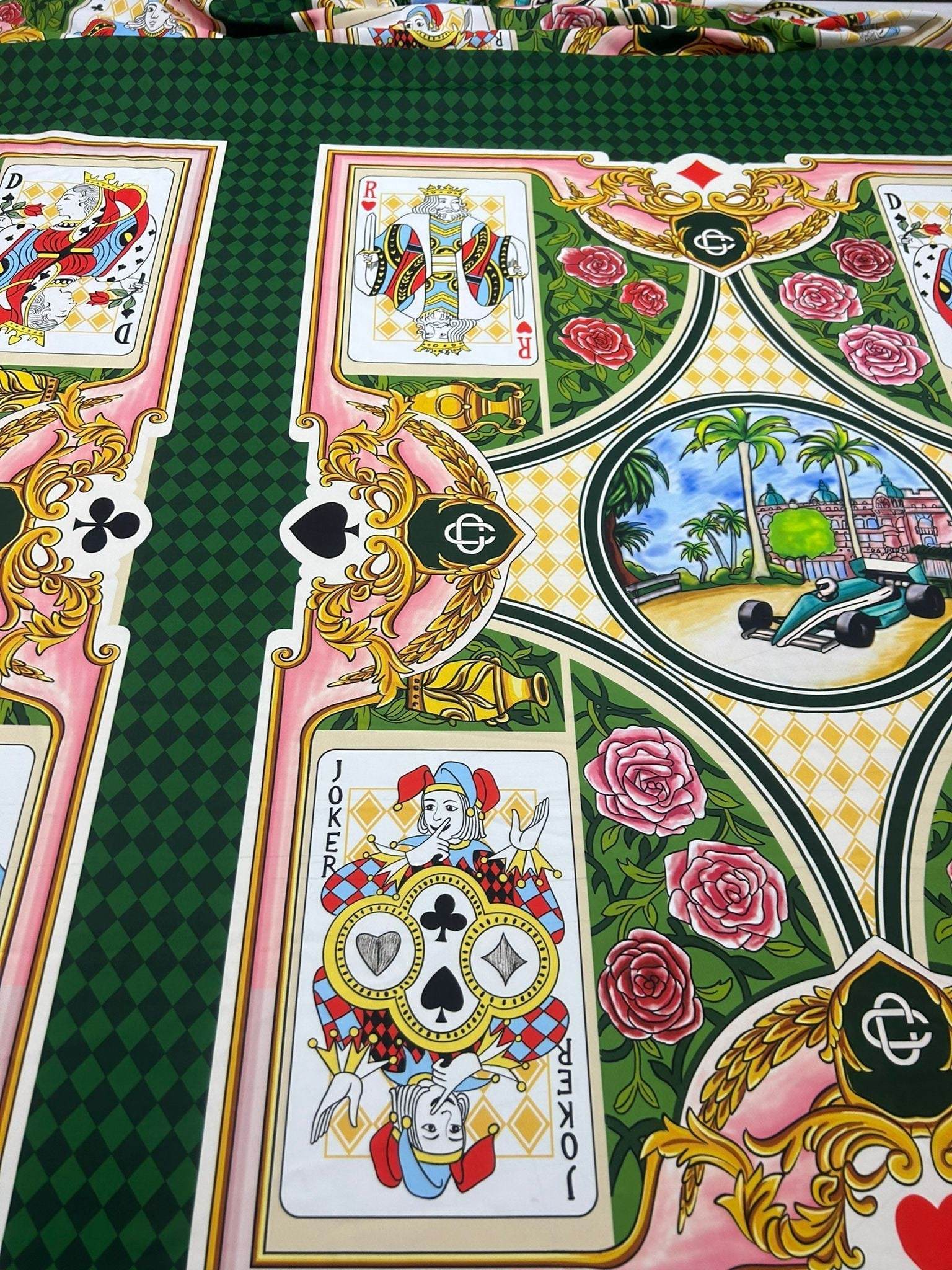 Playing Cards Silky crepe fabric with vibrant card designs and green background for crafts and sewing projects