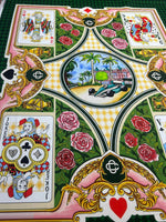 Silky crepe fabric with vibrant playing card and floral design, 150cm width for crafts and sewing projects