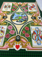 Silky crepe fabric with vibrant playing card design and floral accents for crafts and sewing projects