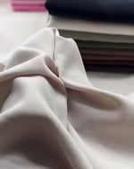 Modal Cupro Fabric by the Metre – Silk-Touch Floss Finish with Elegant Drape displayed in soft folds.
