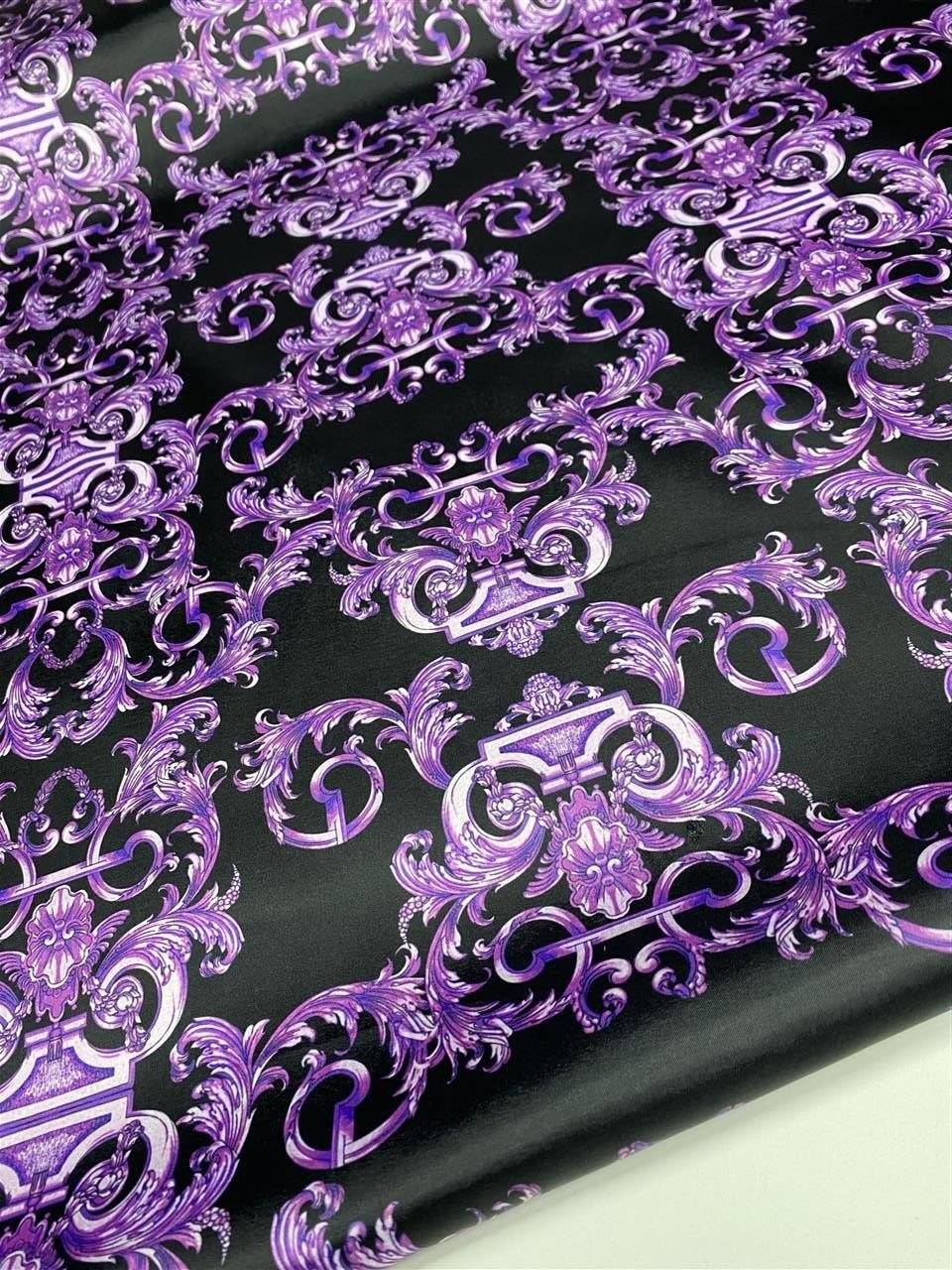 Purple Baroque fabric with intricate purple baroque pattern on a black background, ideal for upholstery and drapery.