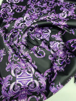 Purple baroque fabric with intricate elegant pattern in rich purple tones on black background, perfect for upholstery and drapery.