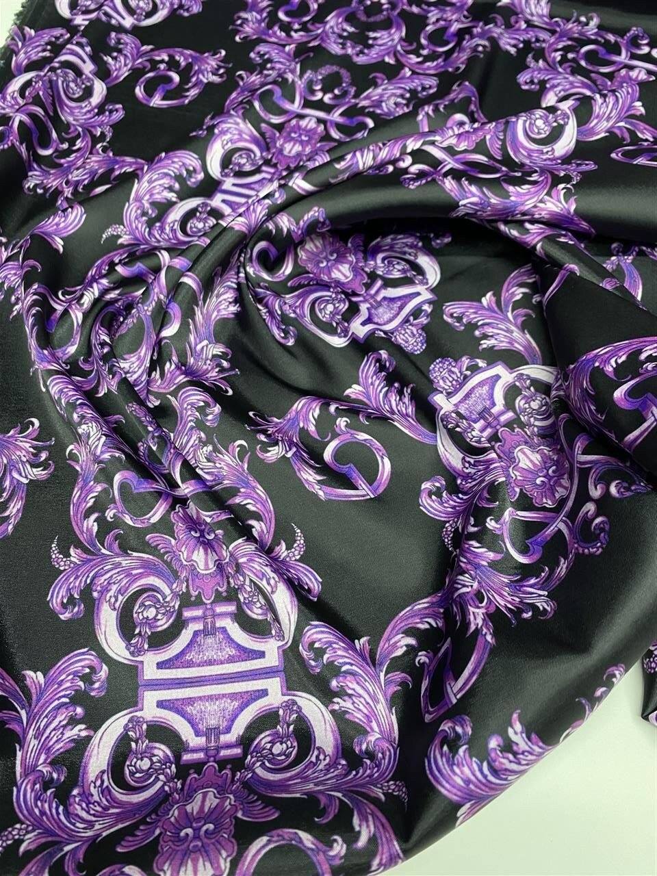 Purple baroque fabric with intricate elegant pattern in rich purple tones on black background, perfect for upholstery and drapery.