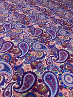 Purple paisley fabric with intricate floral and paisley digital print for upholstery and home decor projects