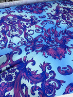Purple and blue baroque pattern fabric with intricate ornamental design and vibrant colors on 150cm wide material