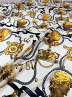 Queen and Rome pattern crepe fabric with gold classical motifs on white background, 150cm wide textile for elegant sewing projects