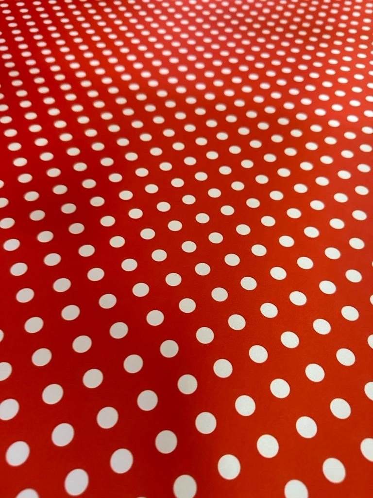 Red white polka dot fabric with 4-way stretch, ideal for sewing projects and crafts