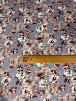 Romantic watercolor floral fabric with soft gray and blush tones and delicate flower patterns