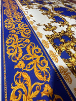 Royal blue fabric with intricate gold baroque pattern for upholstery and decor