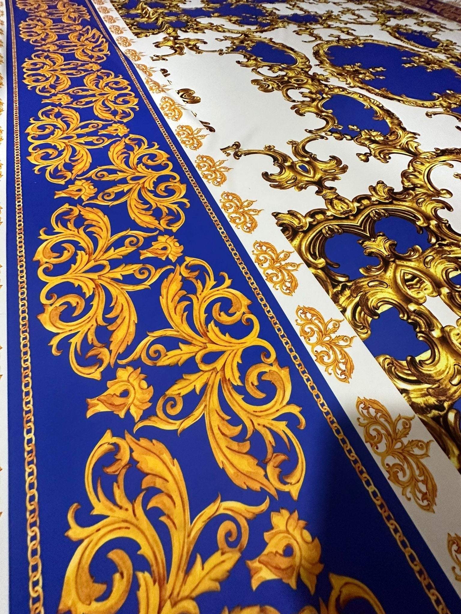 Royal blue fabric with intricate gold baroque pattern for upholstery and decor