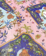 Sugar pink chiffon fabric with colorful sea shell pattern and starfish design