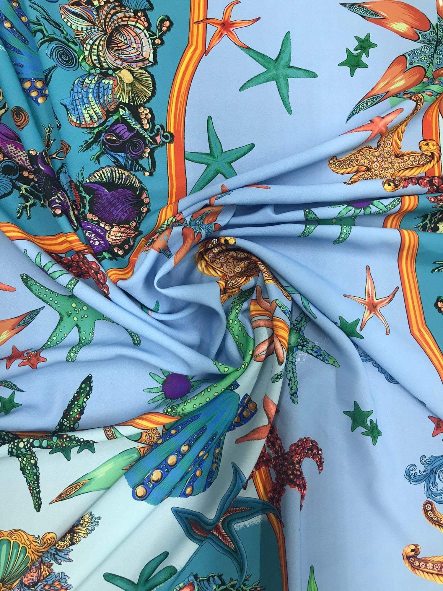 Baby blue fabric with colorful oyster shell and starfish sea life pattern, 150cm width sea shell design textile