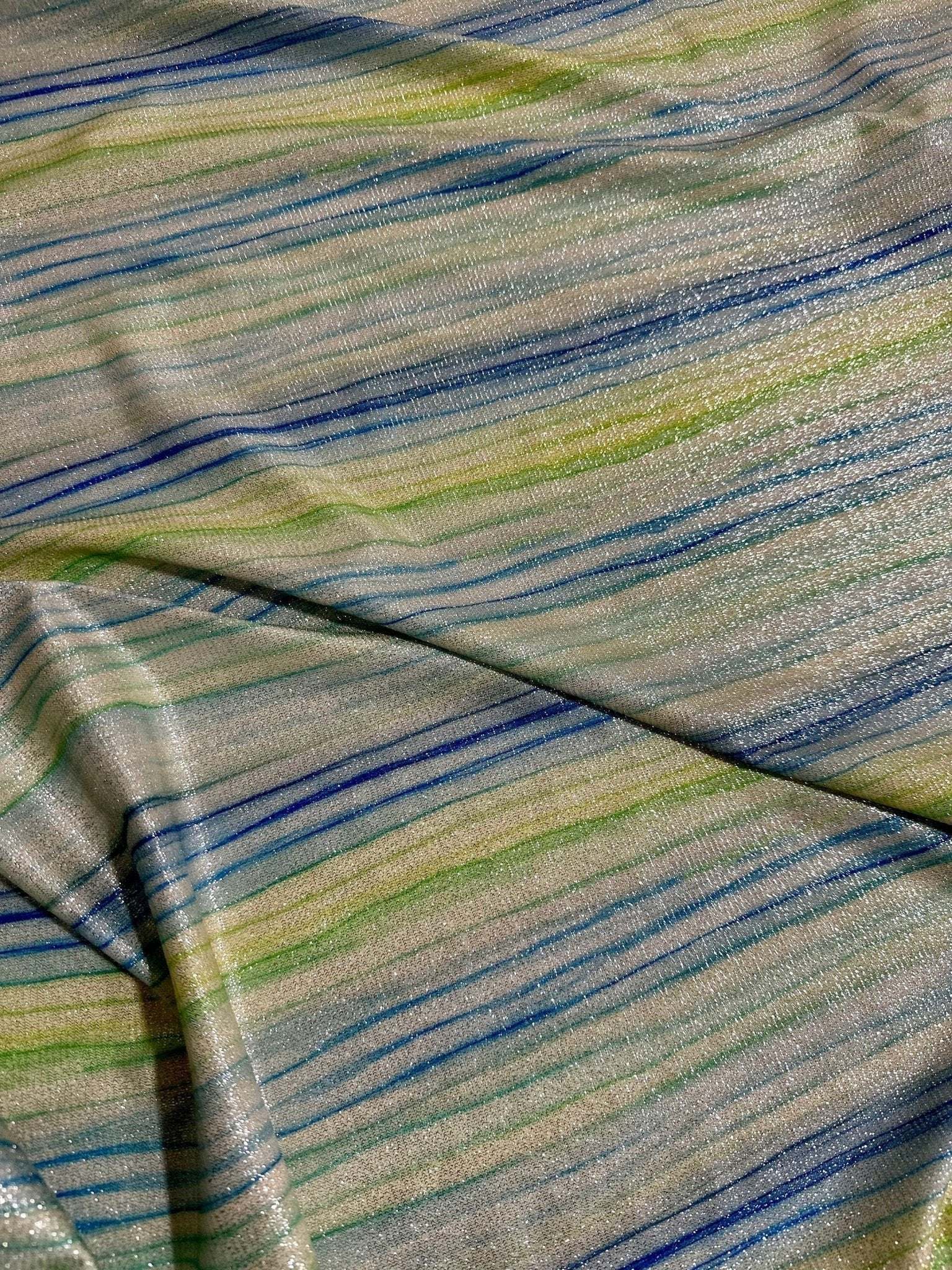 striped shimmer lurex fabric with blue and green horizontal stripes and metallic sheen texture