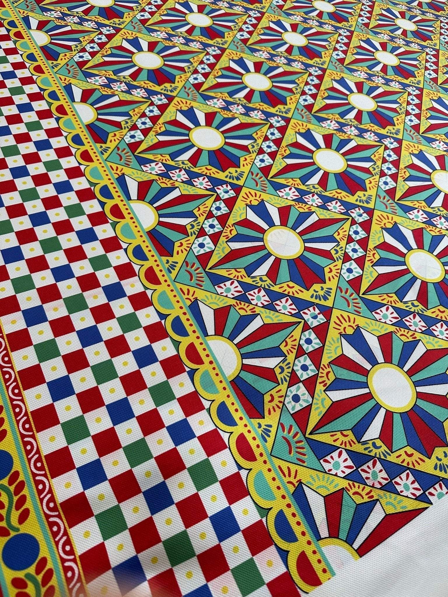 Colorful patterned Sicilian Caretto upholstery fabric with geometric and floral motifs, 150cm wide, ideal for home décor projects.