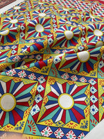 Sicilian Caretto Upholstery Fabric with colorful geometric and floral pattern, durable decorative upholstery textile.