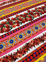 Colorful Sicilian Floral Fabric with red roses and intricate geometric patterns on fabric width of 150cm