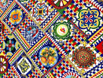 Colorful Sicilian pattern Italian fabric with intricate geometric and floral designs for fashion and home décor