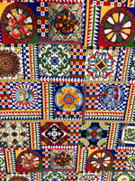 Colorful Sicilian pattern Italian fabric with vibrant geometric and fruit motifs for fashion and home décor