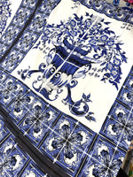 Majolica Floral Upholstery Fabric with intricate blue floral pattern and decorative motifs on white background, 150cm wide upholstery fabric