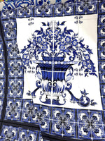 Majolica floral upholstery fabric with vibrant blue and white floral pattern and intricate tile-inspired design