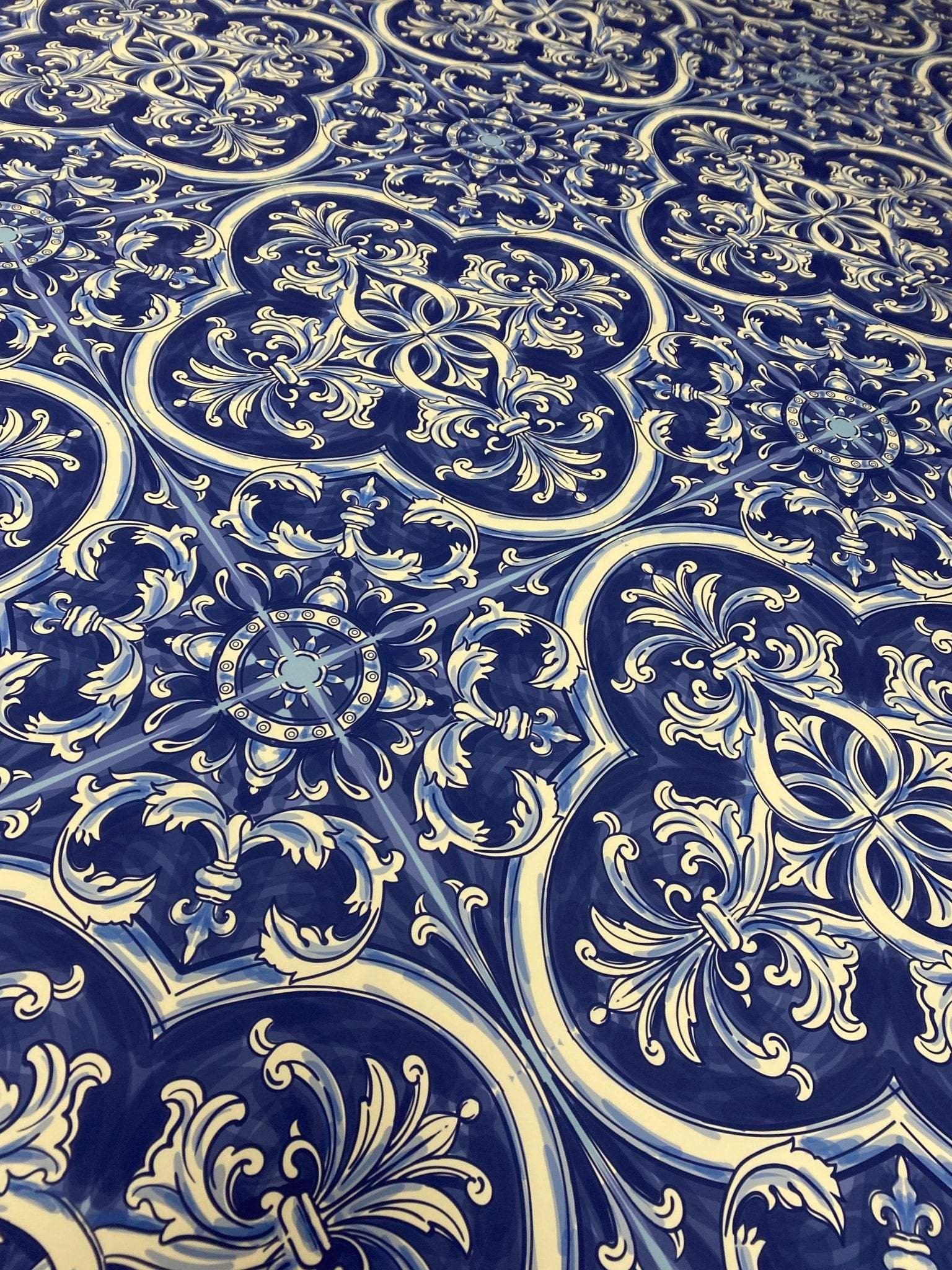 Blue Sicilian print fabric with intricate traditional floral and geometric patterns on 150cm wide textile