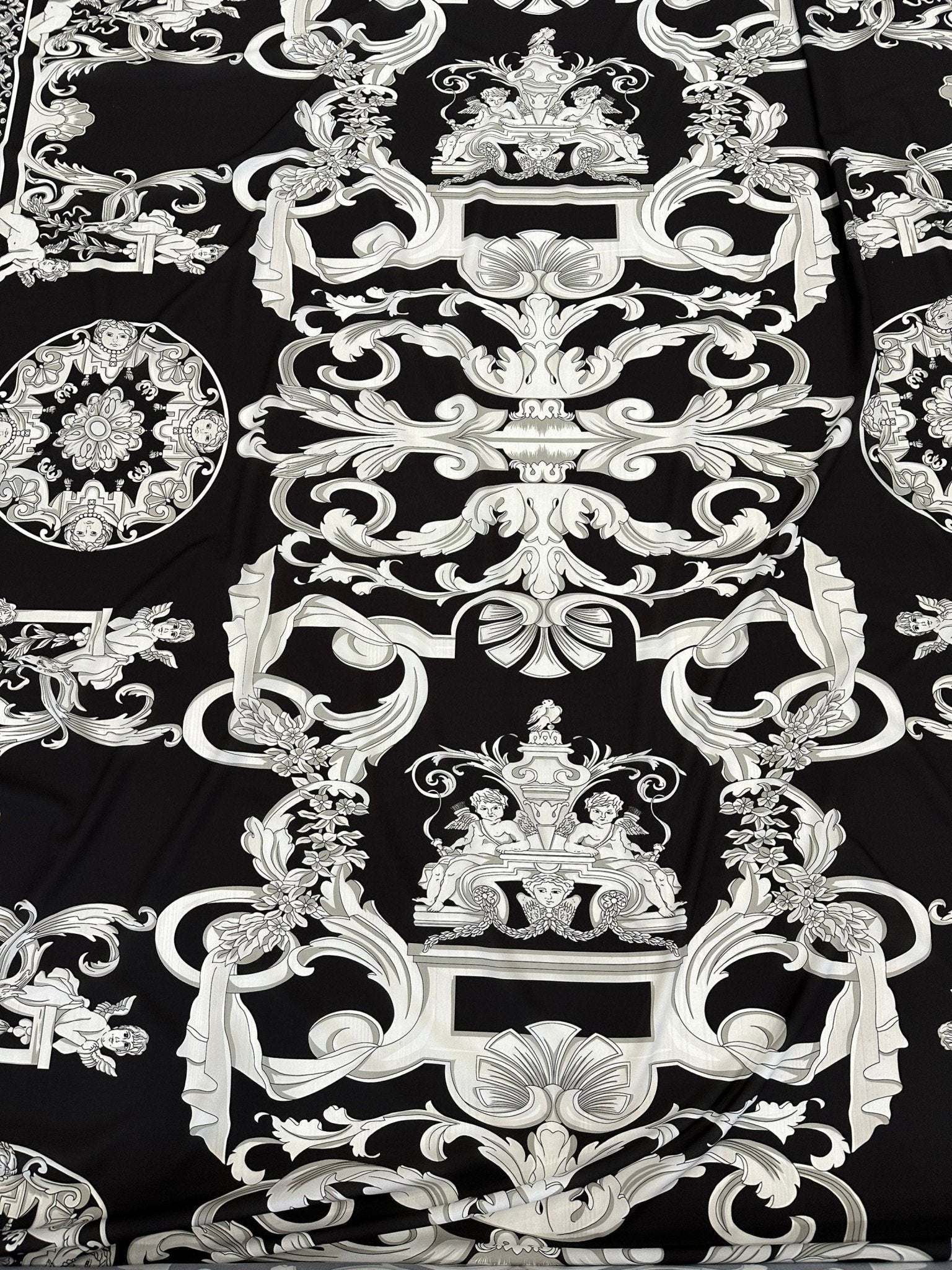 Silver Baroque black fabric with intricate silver baroque pattern ideal for upholstery and fashion projects