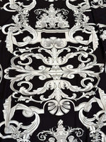 Luxurious silver baroque pattern on black fabric with intricate ornamental design
