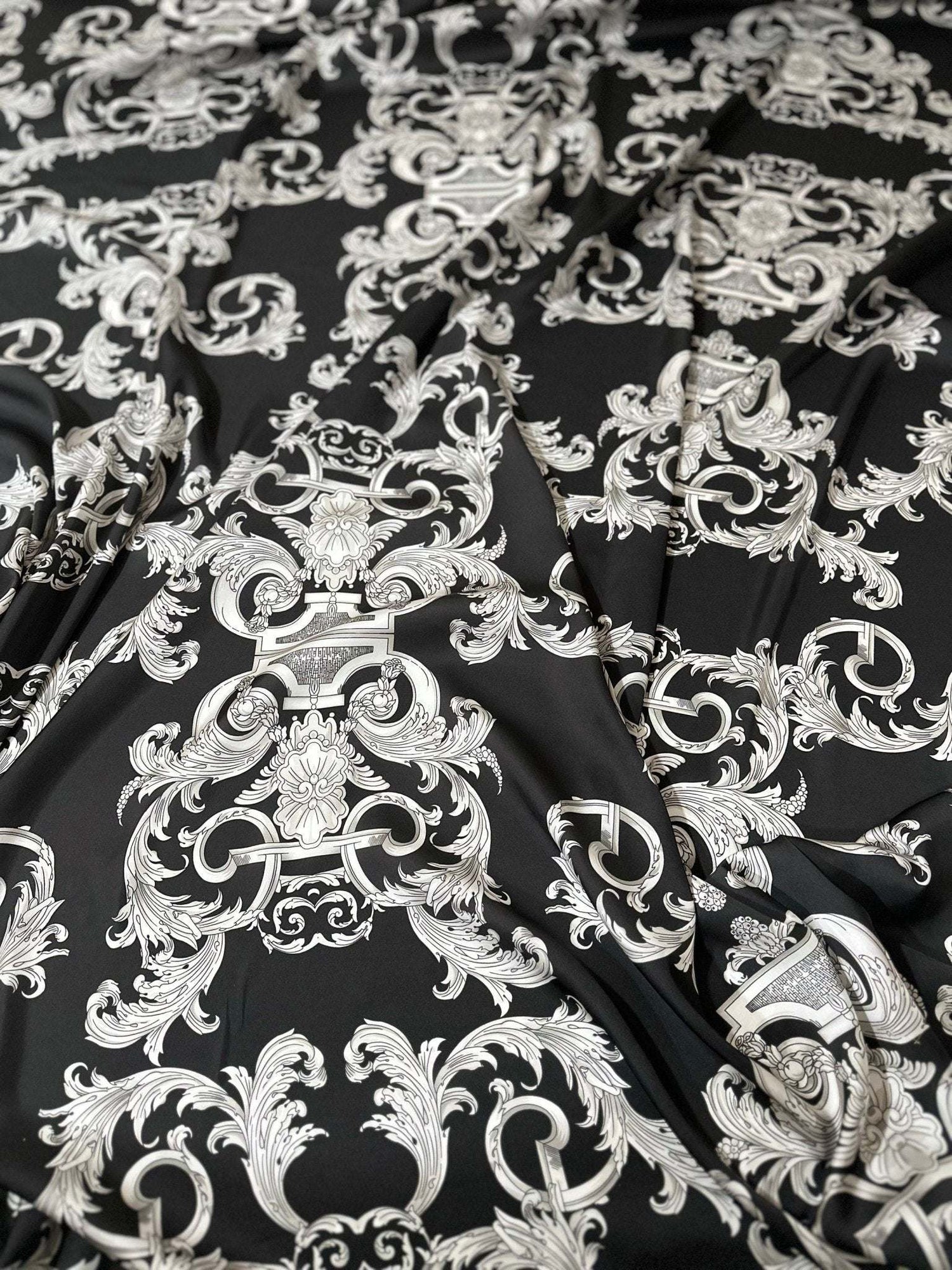 Silver Baroque Fabric with intricate silver baroque pattern on black background, luxurious upholstery and drapery material
