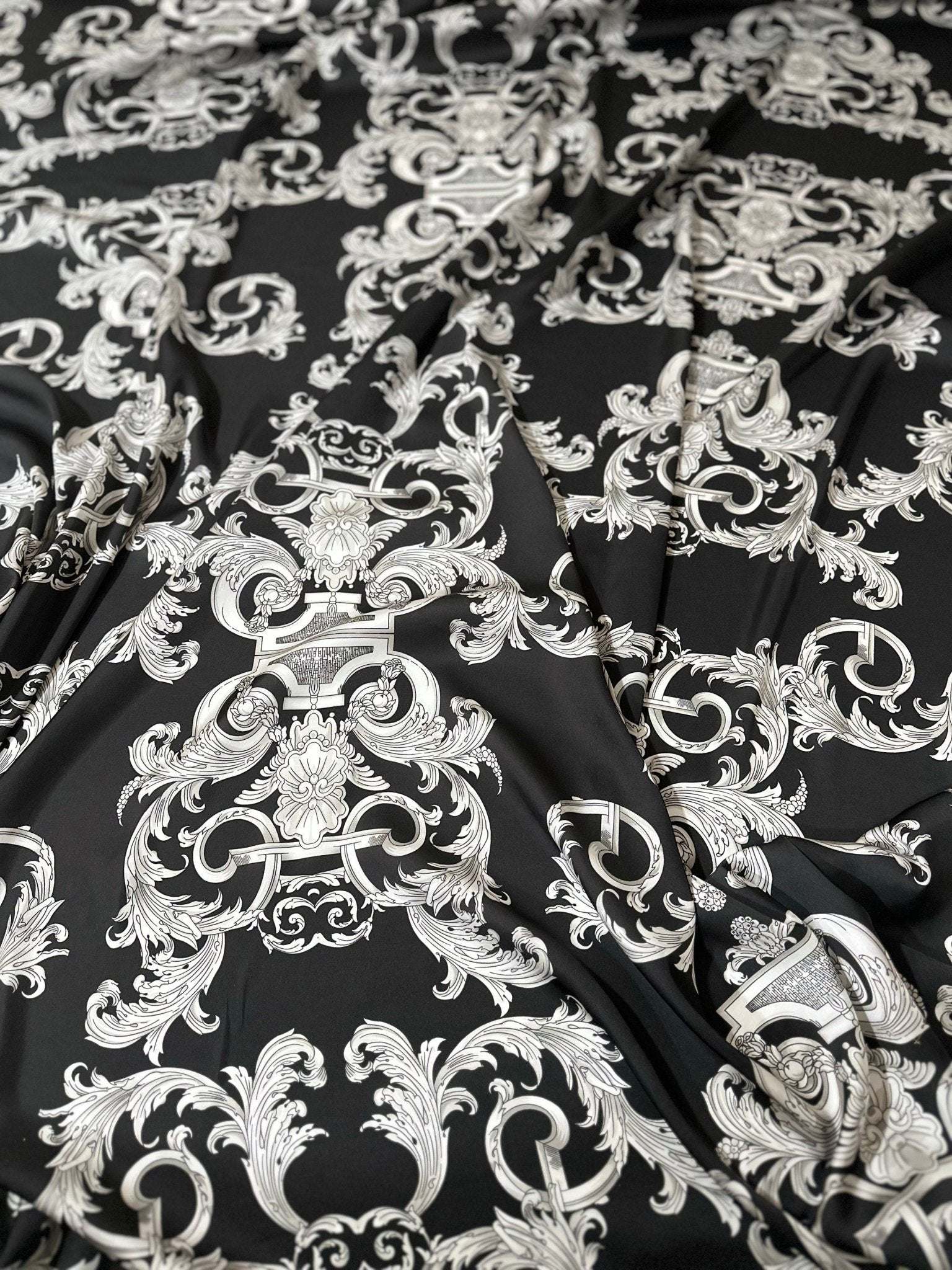 Silver Baroque Fabric with intricate silver baroque pattern on black background, luxurious upholstery and drapery material