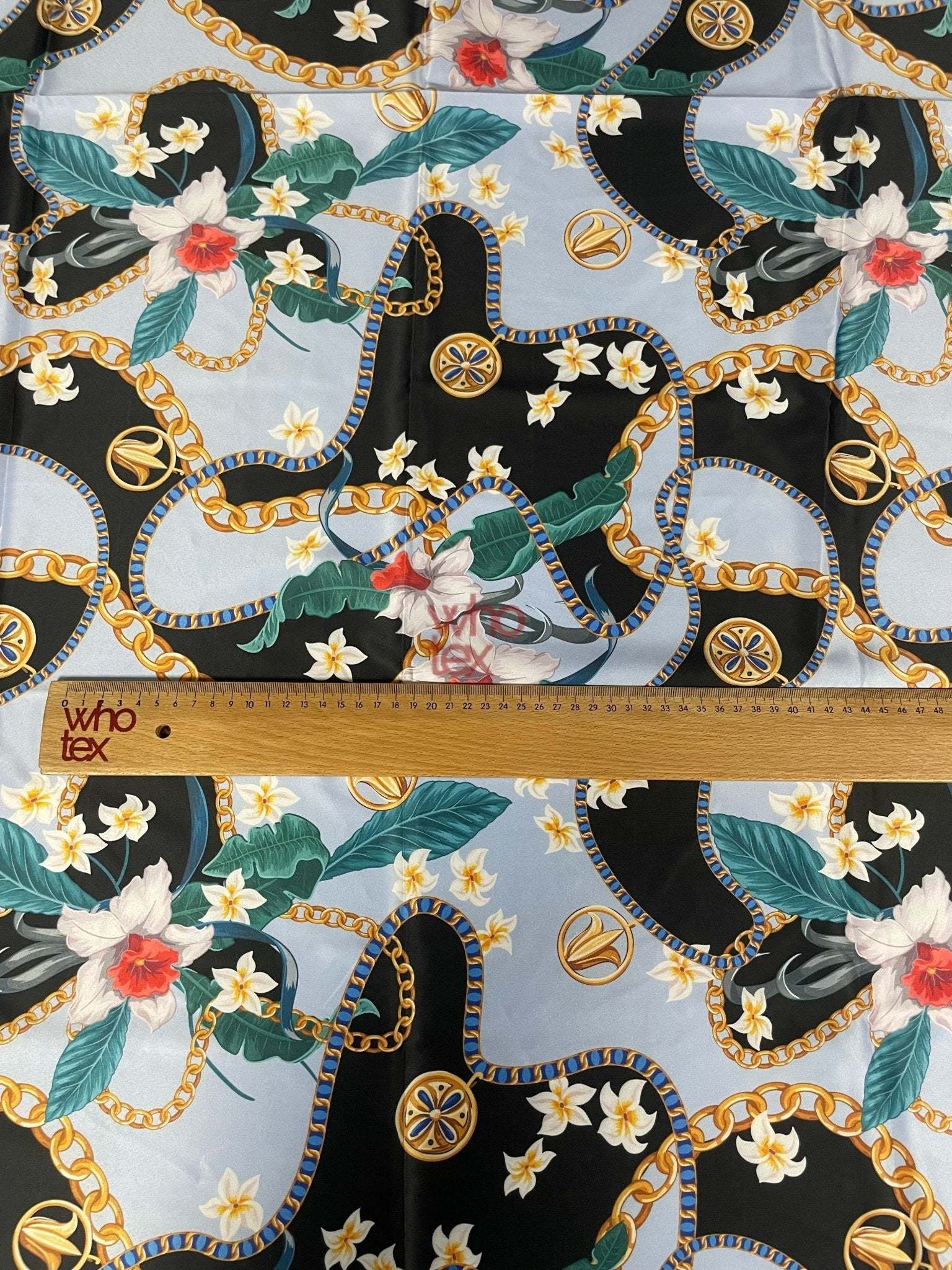 Sky blue fabric with floral and gold chain print, 150cm width