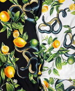 Snake and Lemon Fabric with vibrant lemon and snake print on black and white backgrounds