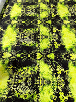 Neon green spandex fabric with black abstract pattern, stretchy material for activewear and costumes