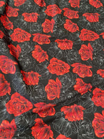 Elegant red rose patterned spandex fabric with black background and floral design