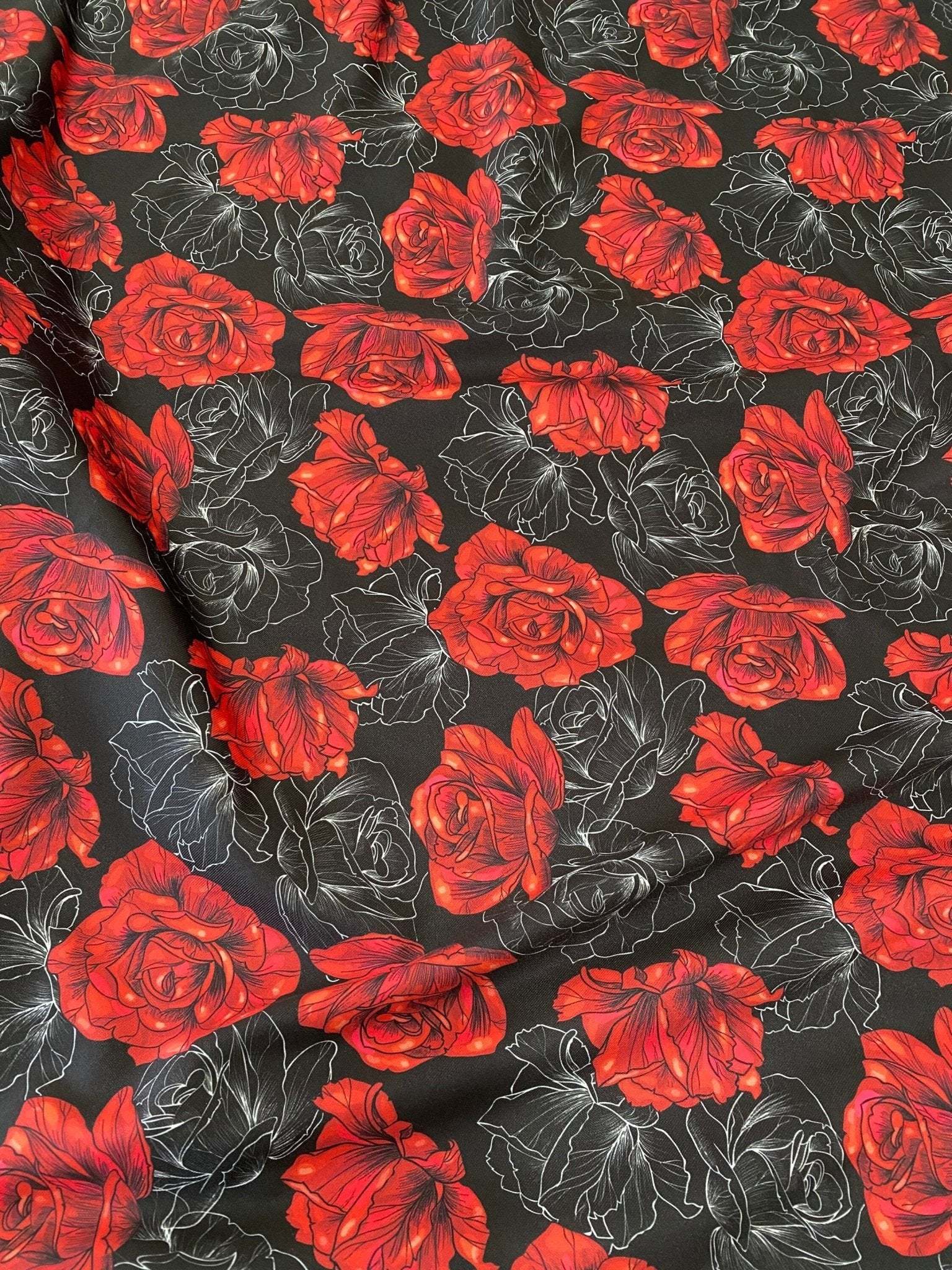 Elegant red rose patterned spandex fabric with black background and floral design