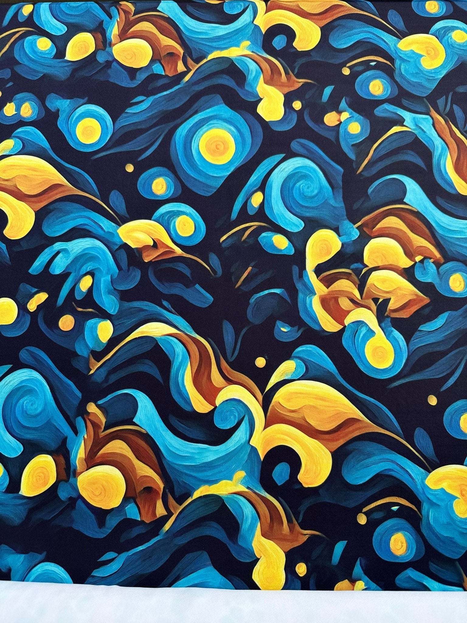 Van Gogh style spandex fabric with vibrant blue and yellow swirling patterns inspired by Starry Night painting
