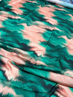 Green and pink pattern tie dye fabric with vibrant wavy design, 150cm wide, soft and durable material for clothing and crafts