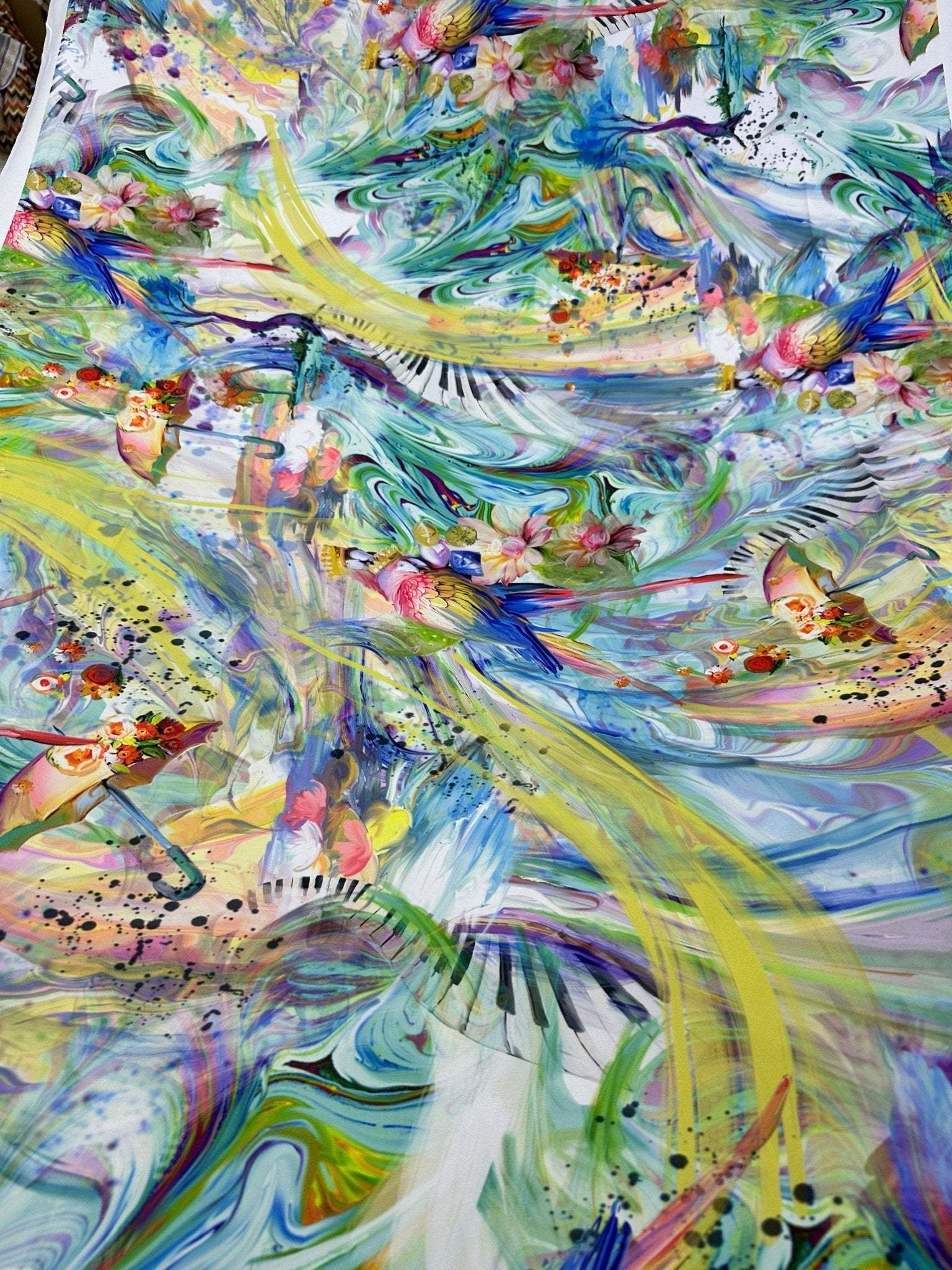 Colorful Bird and Piano Print Fabric with vibrant swirling abstract background and detailed bird and piano illustrations